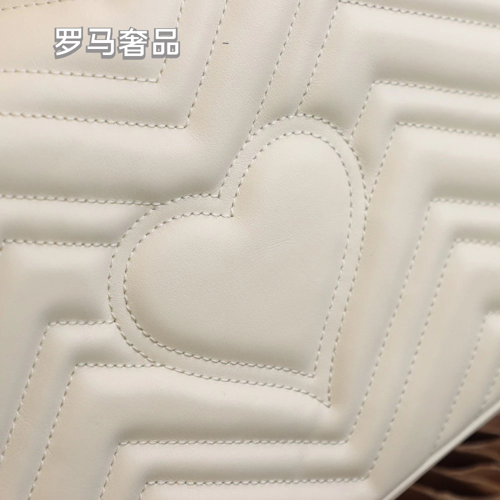 Gucci Elegant White Chevron Quilted Leather Handbag with Gold Hardware