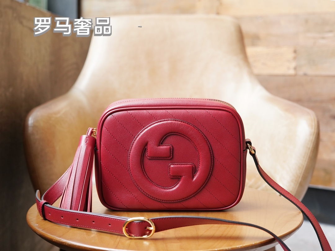 Gucci Red Leather Crossbody Camera Bag with Embossed Logo and Tassel