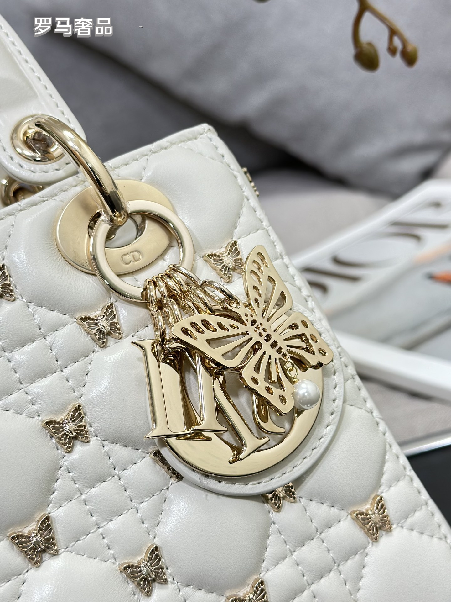 Dior Luxury Black Quilted Leather Handbag with Gold Butterfly Charm