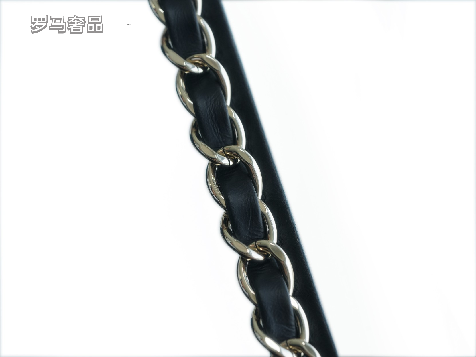 Luxury Black Quilted Leather Handbag with Gold-Tone Chain Strap and Cut-Out Handles