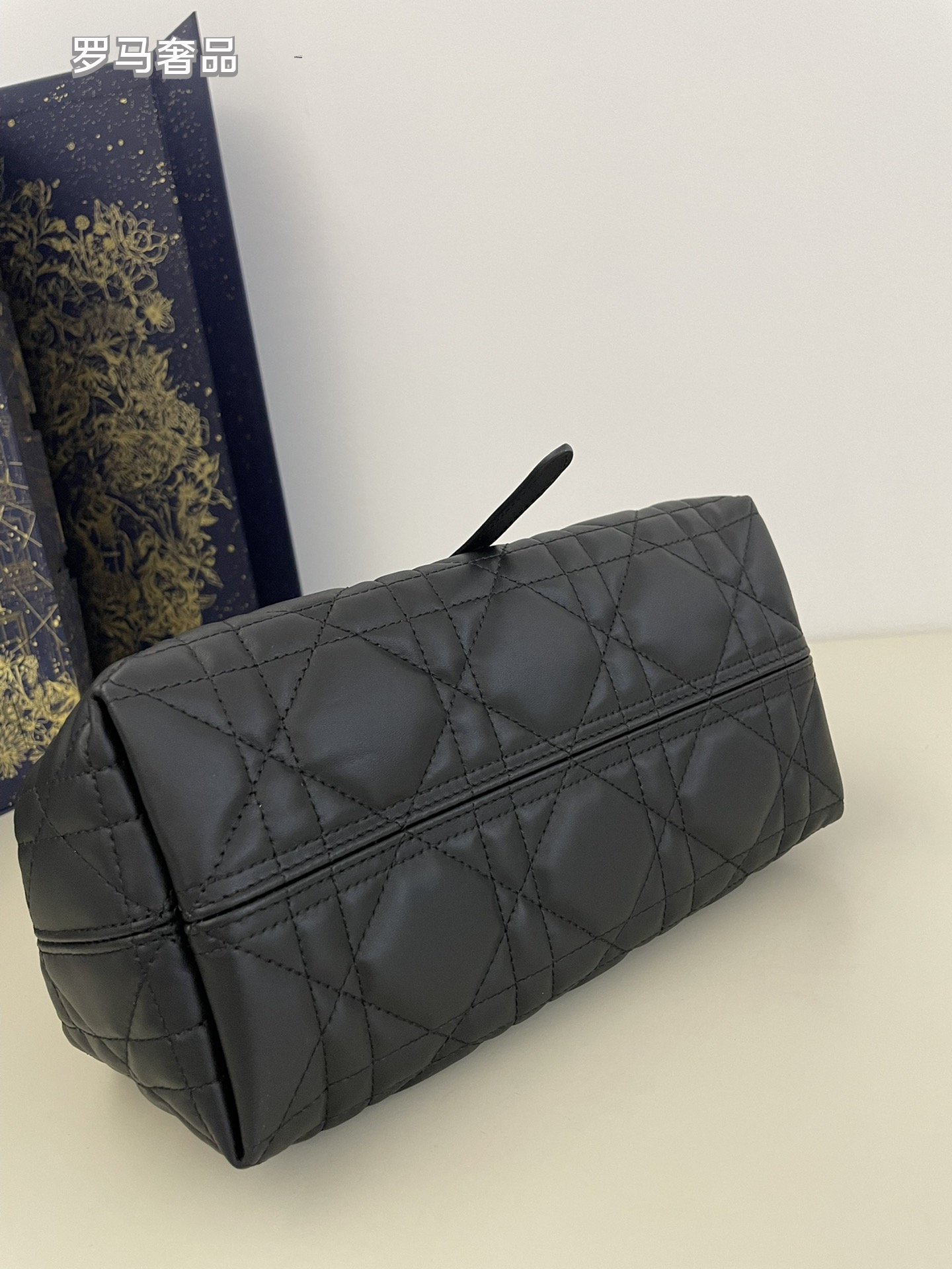 Dior Elegant Black Quilted Top Handle Handbag with Gold Letter Charms