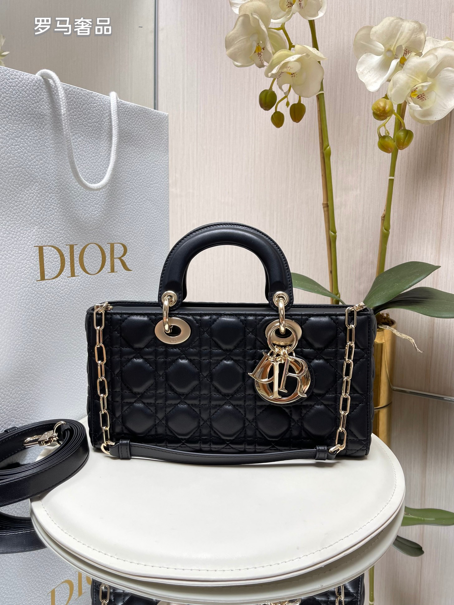 Dior Black Quilted Leather Handbag with Top Handle and Gold Chain Strap