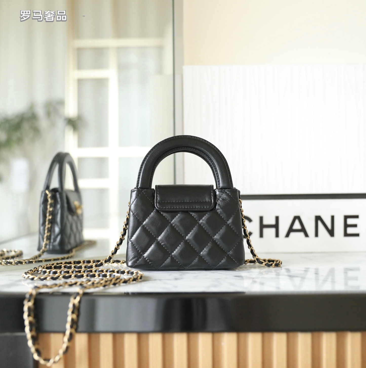 Chanel Black Quilted Lambskin Mini Top Handle Bag Gold-Tone Hardware