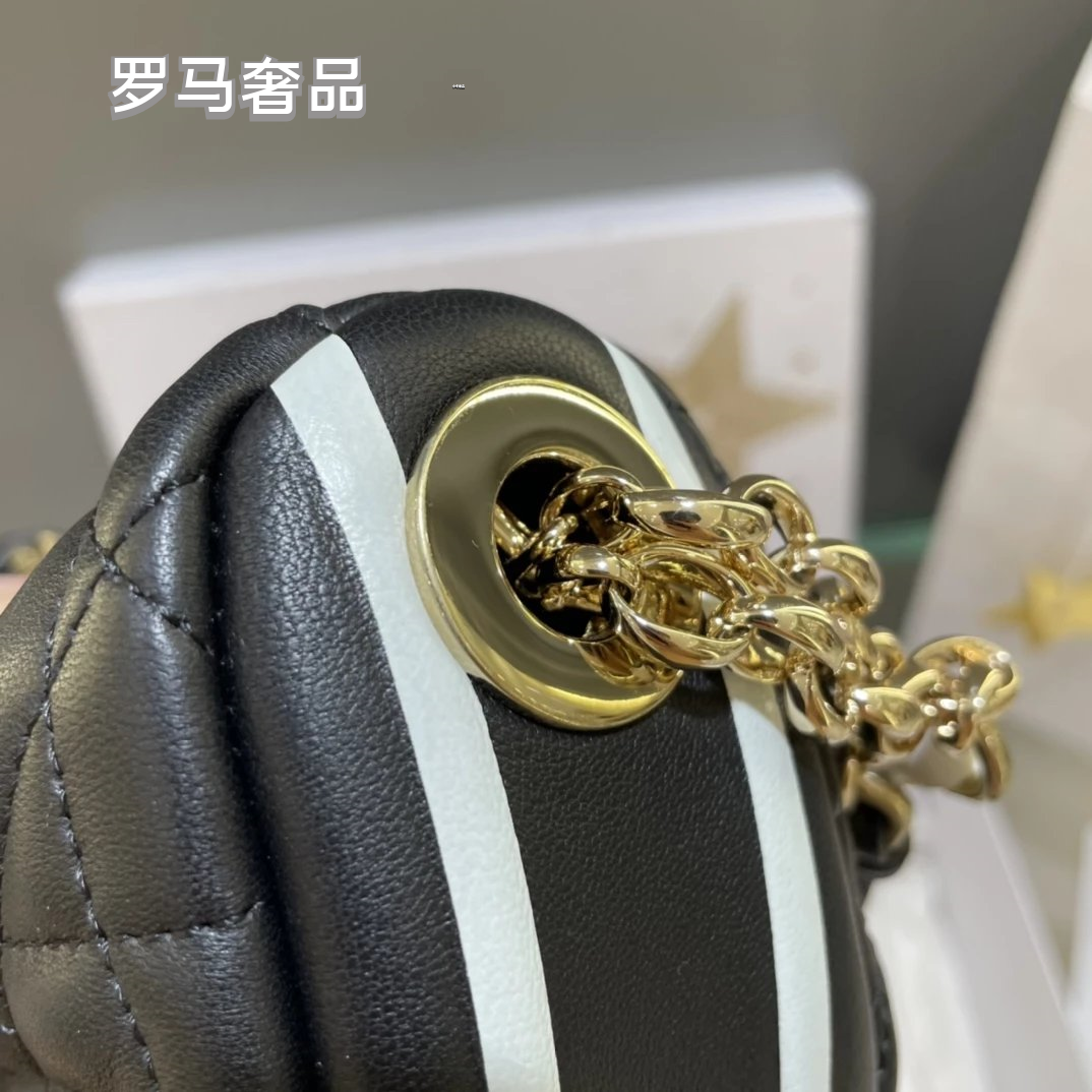 Luxury Black Quilted Leather Shoulder Bag with Gold Chain and White Handle