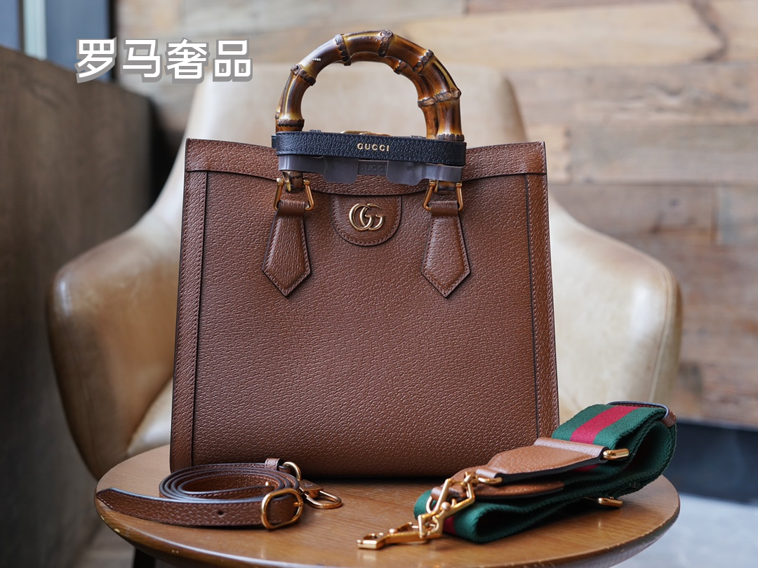 Gucci Elegant Off-White Leather Tote Bag with Bamboo Handles and Web Strap