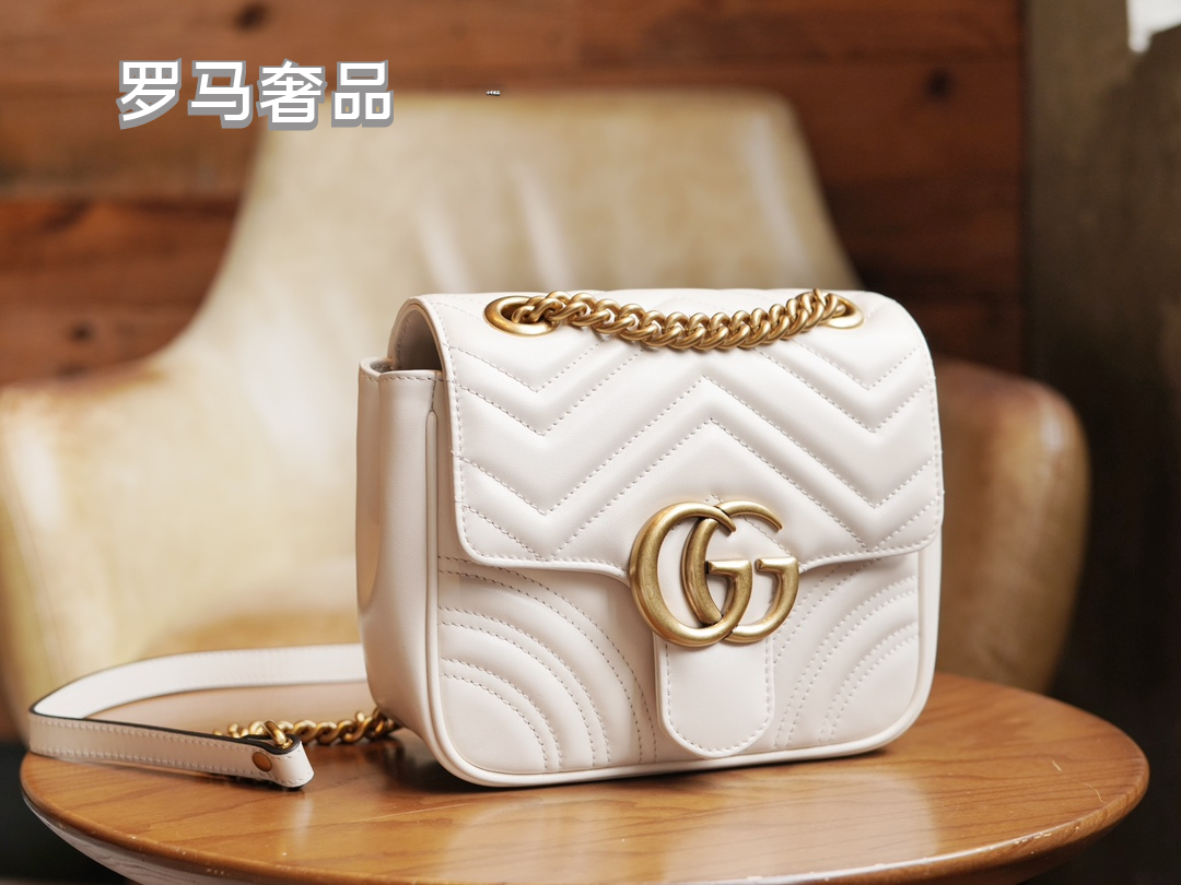 Gucci Elegant Quilted White Leather Shoulder Bag with Gold Chain Strap