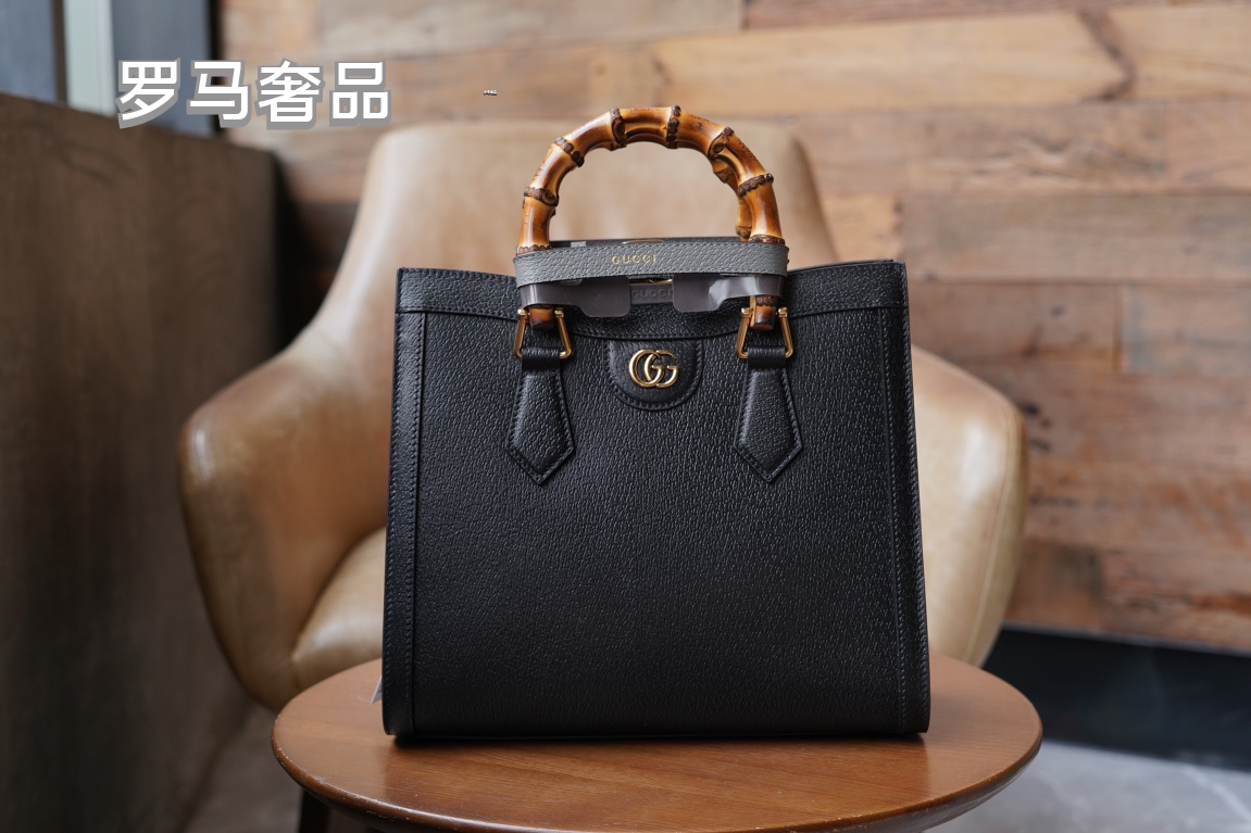 Gucci Elegant Off-White Leather Tote Bag with Bamboo Handles and Web Strap