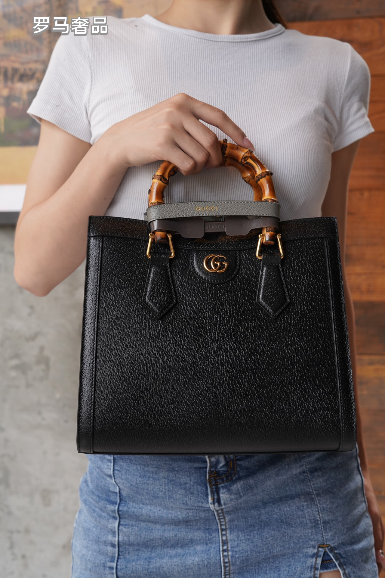 Gucci Elegant Off-White Leather Tote Bag with Bamboo Handles and Web Strap