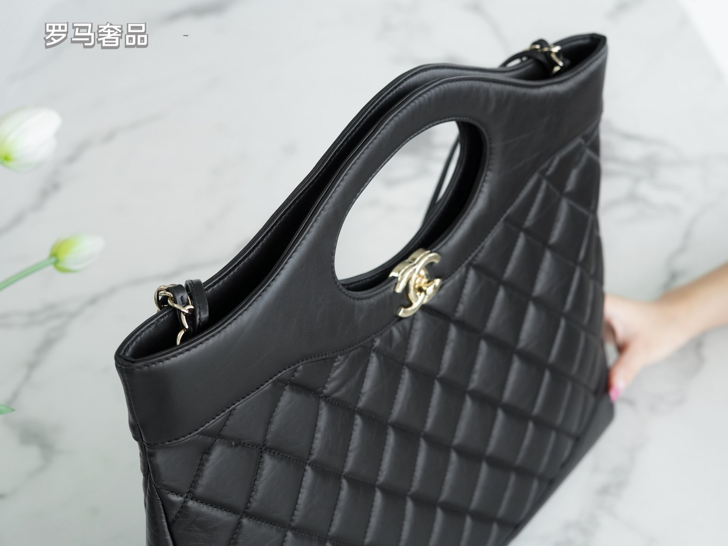 Luxury Black Quilted Leather Handbag with Gold-Tone Chain Strap and Cut-Out Handles