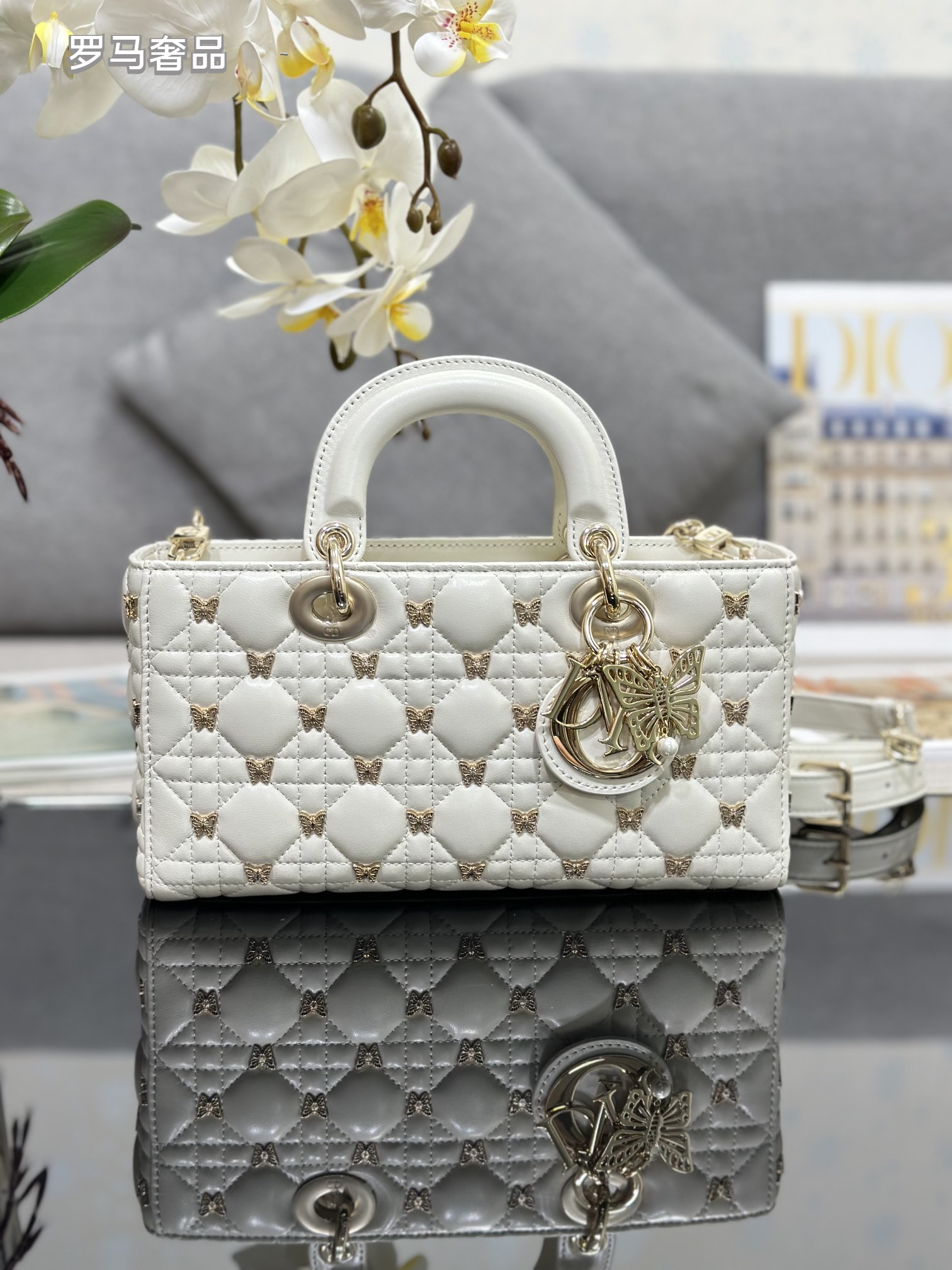 Dior Luxury Black Quilted Leather Top Handle Bag with Gold Butterfly Charm