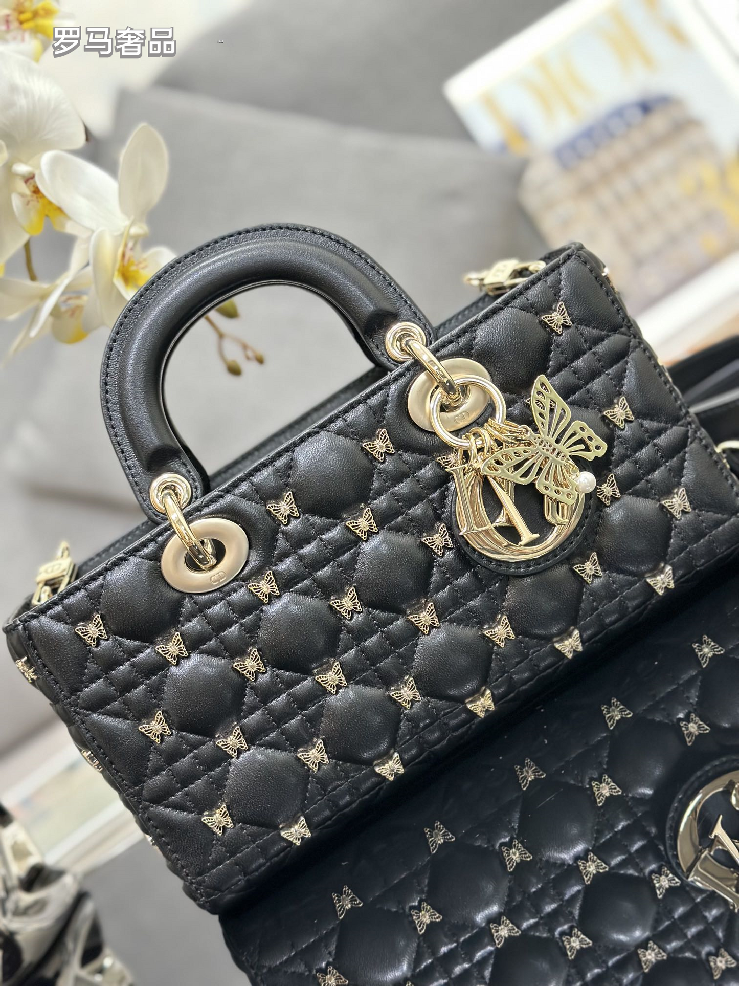Dior Luxury Black Quilted Leather Top Handle Bag with Gold Butterfly Charm