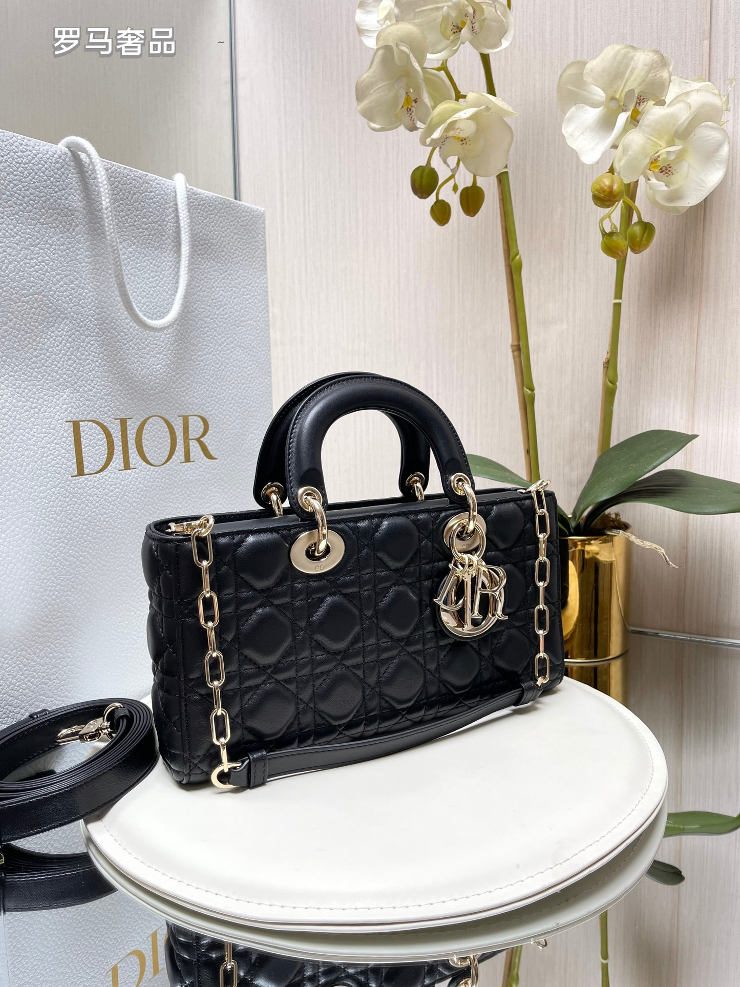 Dior Black Quilted Leather Handbag with Top Handle and Gold Chain Strap