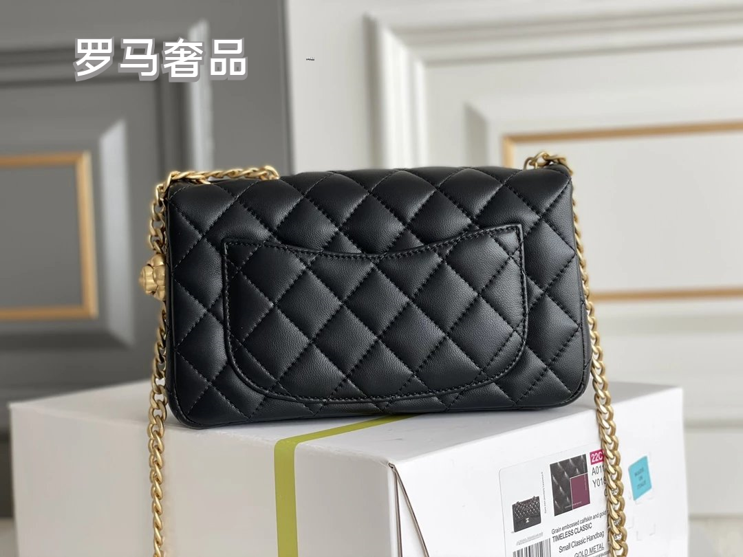 Black Quilted Leather Mini Flap Bag with Gold-Tone Chain and Camellia Charm