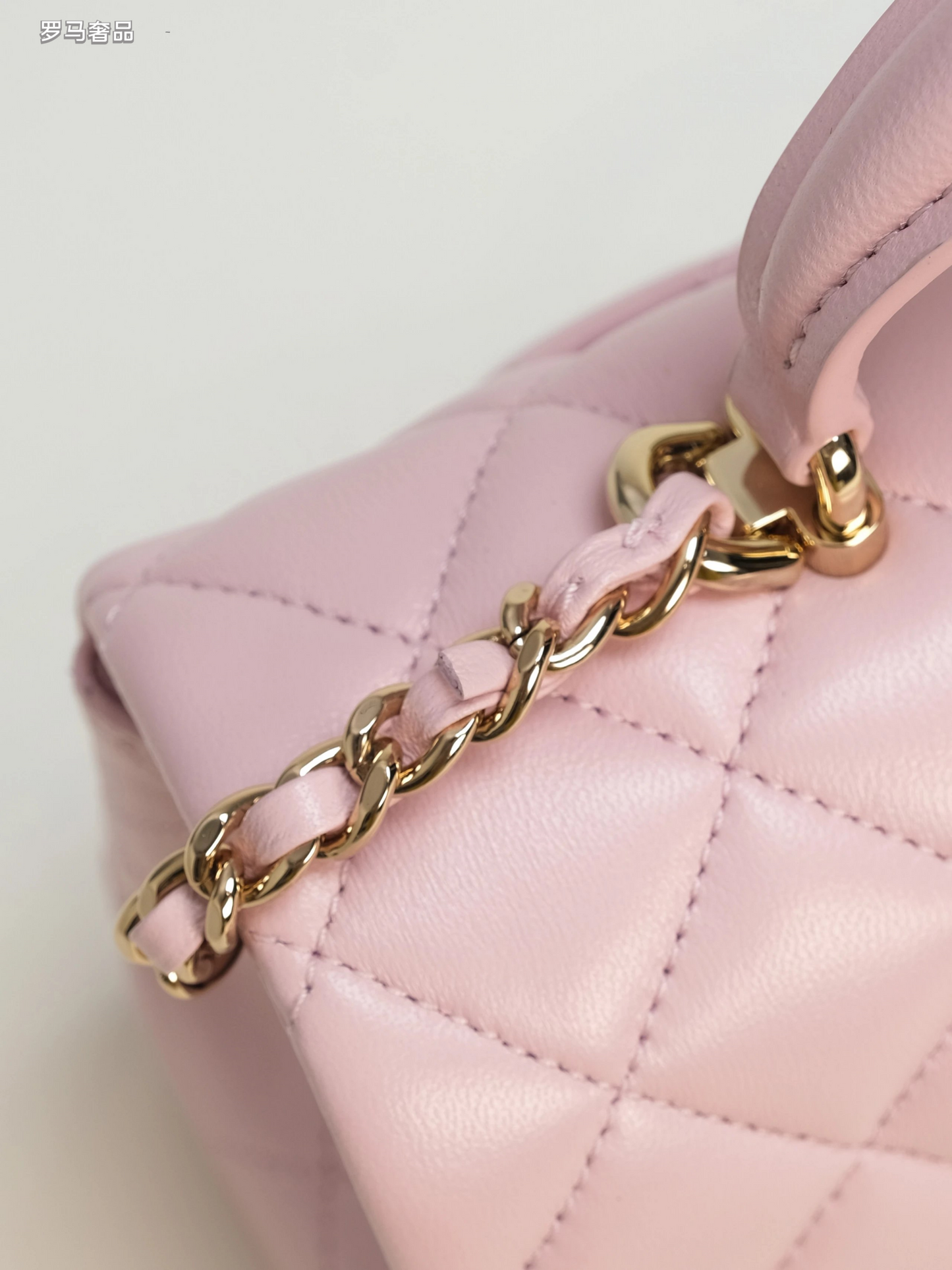 Pink Quilted Top Handle Handbag with Gold-Tone Chain Strap