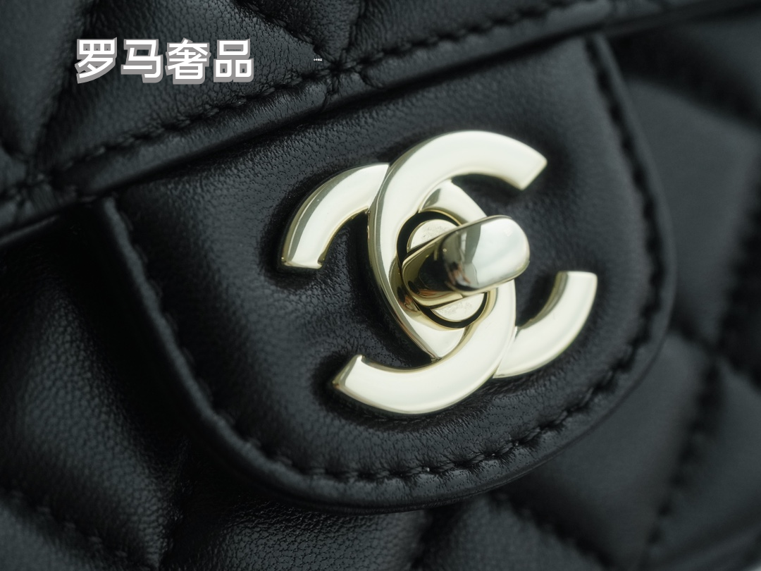 Elegant Black Quilted Leather Top Handle Flap Bag with Silver-Tone Chain