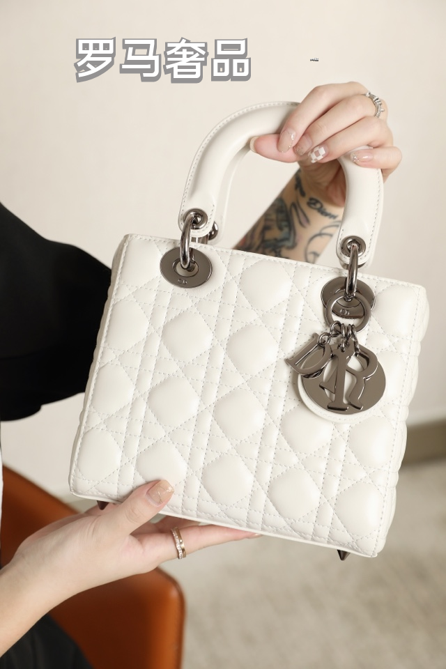 Dior Elegant Light Gray Quilted Top Handle Handbag with Shoulder Strap